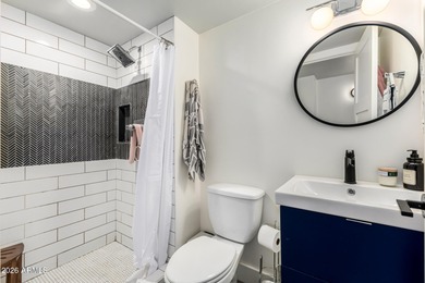 This stunning corner-unit apartment offers high-rise living with