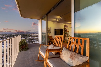 This stunning corner-unit apartment offers high-rise living with