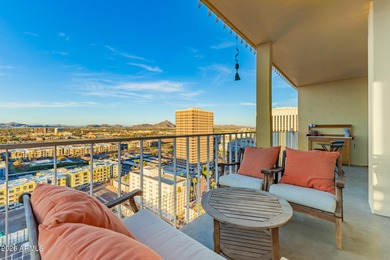 This stunning corner-unit apartment offers high-rise living with