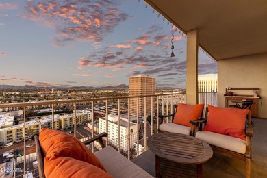 This stunning corner-unit apartment offers high-rise living with