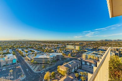 This stunning corner-unit apartment offers high-rise living with