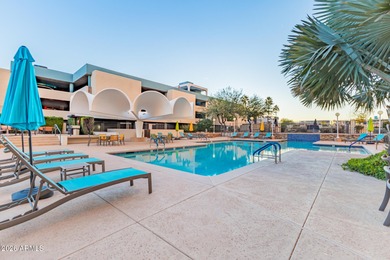 This stunning corner-unit apartment offers high-rise living with