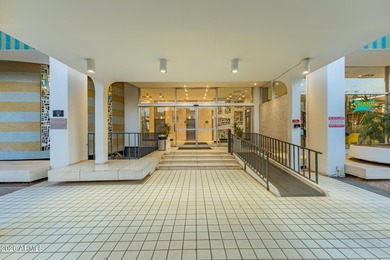 This stunning corner-unit apartment offers high-rise living with