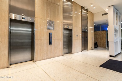 This stunning corner-unit apartment offers high-rise living with