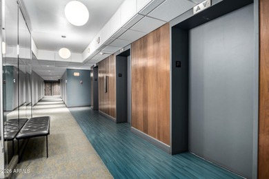 This stunning corner-unit apartment offers high-rise living with