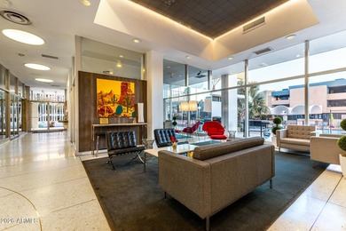 This stunning corner-unit apartment offers high-rise living with