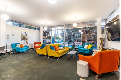 This stunning corner-unit apartment offers high-rise living with