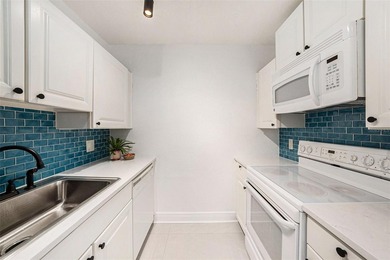 Welcome to this beautifully updated top corner condo offering - photo 7