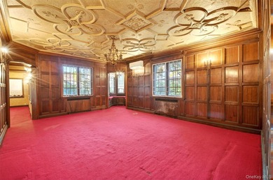This extraordinary Tudor mansion sits on an expansive 112x100 - photo 2