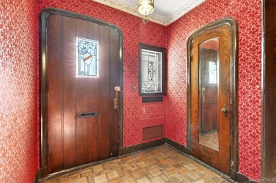 This extraordinary Tudor mansion sits on an expansive 112x100 - photo 7