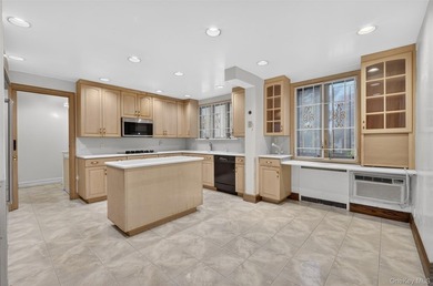 This extraordinary Tudor mansion sits on an expansive 112x100 - photo 9