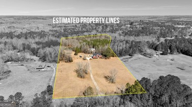 Welcome to this exceptional four-sided brick estate nestled on - photo 3