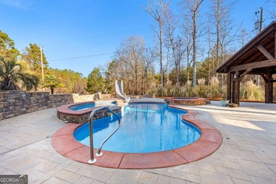 Welcome to this exceptional four-sided brick estate nestled on - photo 4