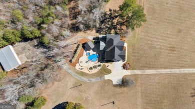 Welcome to this exceptional four-sided brick estate nestled on - photo 6
