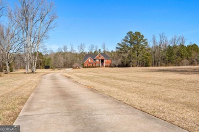 Welcome to this exceptional four-sided brick estate nestled on - photo 10