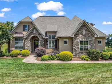 Welcome home to this beautifully maintained stucco and stone - photo 3