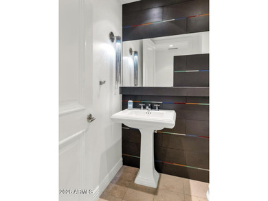 This stunning luxury condominium in the highly coveted