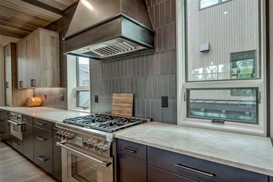 Experience elevated mountain living in this like-new luxury - photo 18