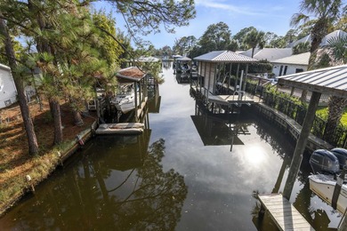 Step into this canal-front property with direct access to Buck - photo 1