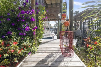 Step into this canal-front property with direct access to Buck - photo 6