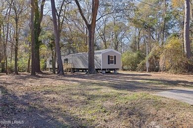 Nestled in the heart of the Lowcountry, this fully furnished - photo 3