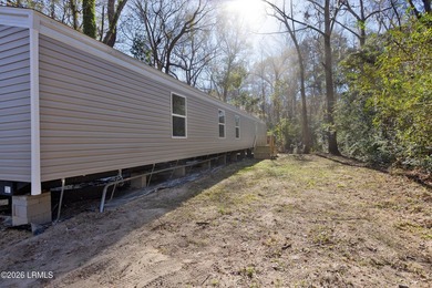 Nestled in the heart of the Lowcountry, this fully furnished - photo 6
