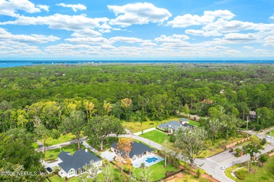 Exclusive 1-Acre Homesite in Prestigious Gated Riverfront - photo 3