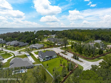 Exclusive 1-Acre Homesite in Prestigious Gated Riverfront - photo 5