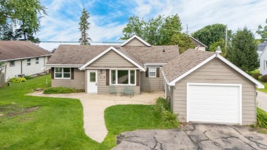 This property features direct access to Lake Butte Des Mort and - Lake Home For Sale in Butte Des Morts, Wisconsin