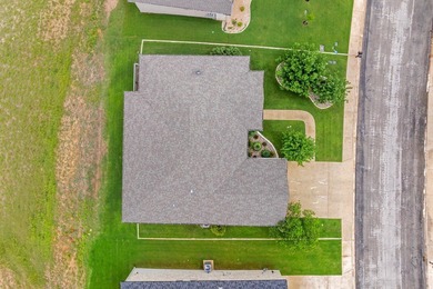 Beautifully maintained 3-bedroom, 2 bath, custom home built in