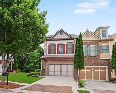 Experience elevated living in this exquisitely updated endunit - photo 1