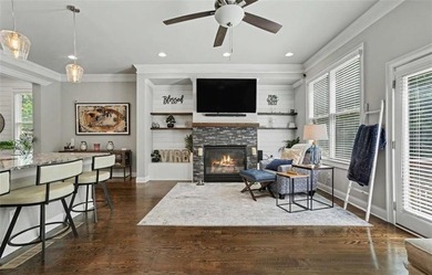 Experience elevated living in this exquisitely updated endunit - photo 3