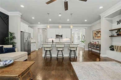 Experience elevated living in this exquisitely updated endunit - photo 6