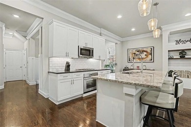 Experience elevated living in this exquisitely updated endunit - photo 9