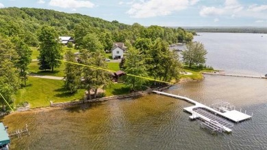 Lake Home For Sale in Forest Home Twp, Michigan