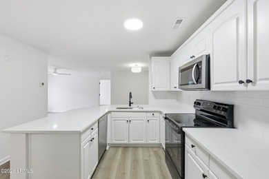 Welcome to The Estates at Westbury! Renovated in 2026, this - photo 9