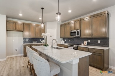 Welcome to this stunning 4-bedroom, 3-bathroom custom home