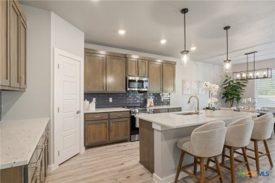 Welcome to this stunning 4-bedroom, 3-bathroom custom home