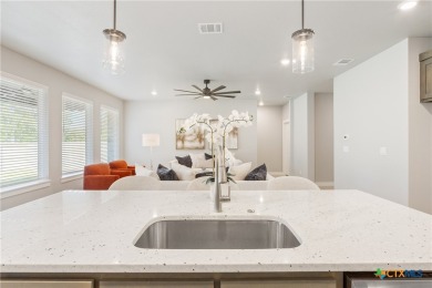 Welcome to this stunning 4-bedroom, 3-bathroom custom home