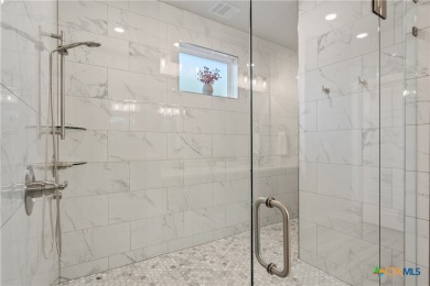 Welcome to this stunning 4-bedroom, 3-bathroom custom home