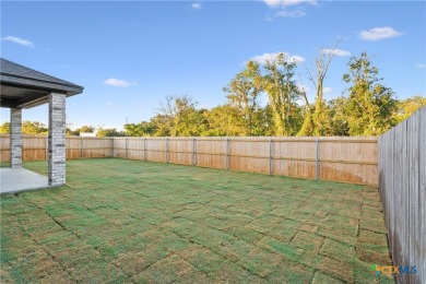 Welcome to this stunning 4-bedroom, 3-bathroom custom home