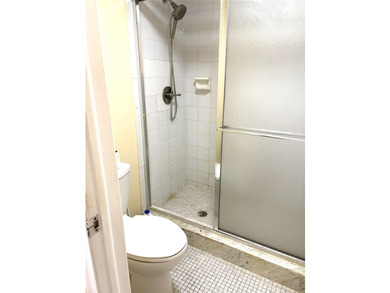 PRICE ADJUSTMENT! SPACIOUS AND BEAUTIFULLY MAINTAINED CONDO - photo 11