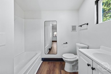 Welcome to 604 W. 40th Street, where timeless charm meets modern - photo 25
