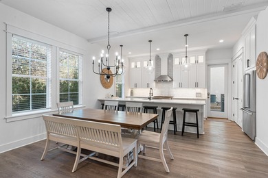 Tucked within the gated enclave of Tops'l Beach & Racquet Resort - photo 4