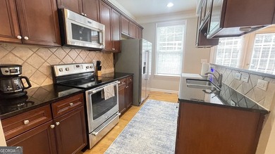 Stately Brick Townhouse (2 Car Garage End-Unit) in Sought-After - photo 25