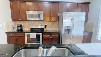 Stately Brick Townhouse (2 Car Garage End-Unit) in Sought-After - photo 26