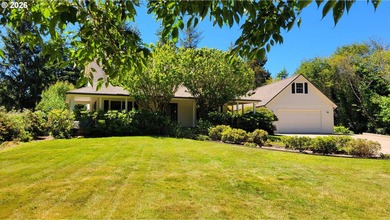 Stunning farmhouse & SHOP on 1.18 manicured acres! Nestled - photo 1