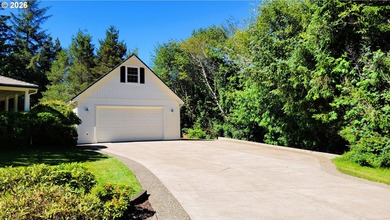 Stunning farmhouse & SHOP on 1.18 manicured acres! Nestled - photo 2