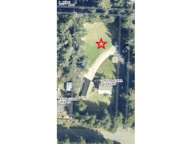 Stunning farmhouse & SHOP on 1.18 manicured acres! Nestled - photo 3