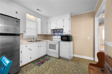 Welcome to 108 Belmont Circle - a charming 3 or 4 bedroom, 1